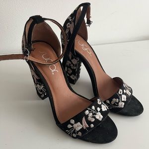 Black heels with colourful flowers embroidered